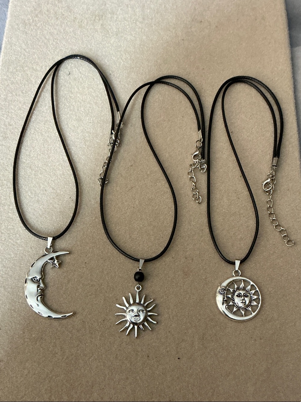Silver Sun and Moon Pendant Necklace Trio on Black Cord